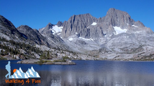 Garnet Lake with Banner Peak looming in the distance and reflected in the water.