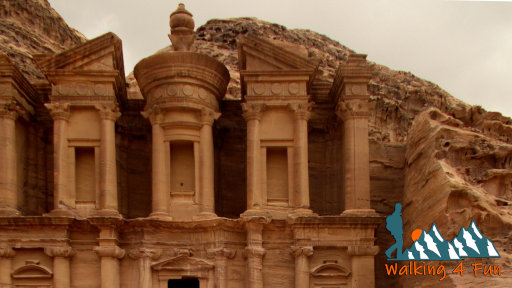 An ancient, well-preserved ruin carved directly into a cliff