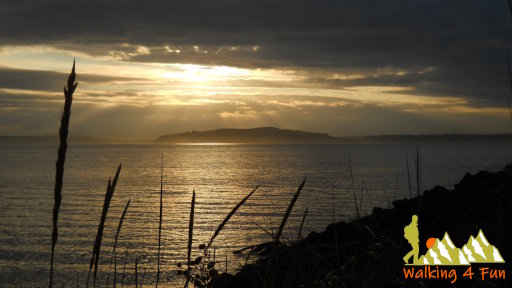 A beautiful sunset overlooking Puget Sound on a mostly cloudy sky